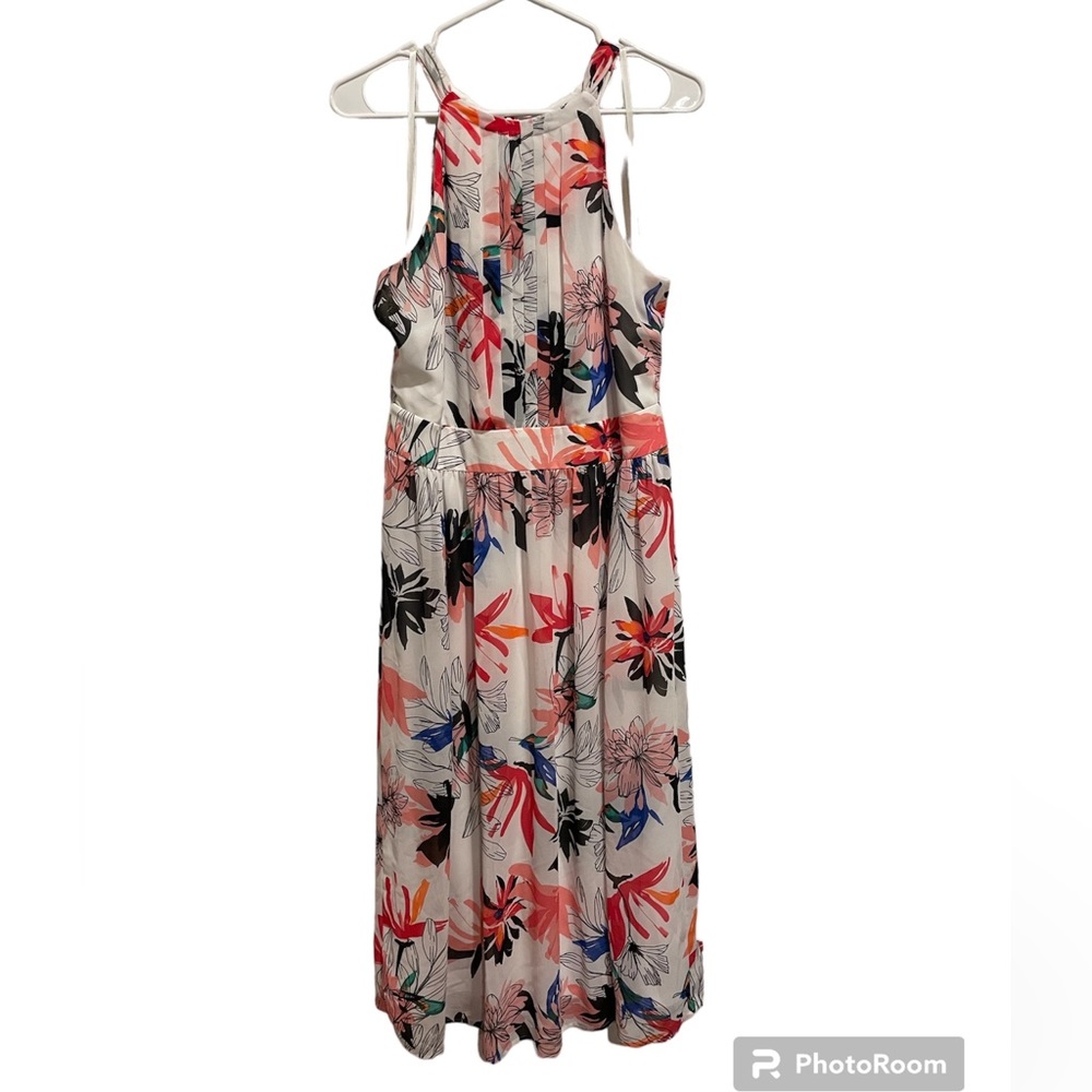 Beautiful Nine West floral halter dress with tie at neck and drop waist.